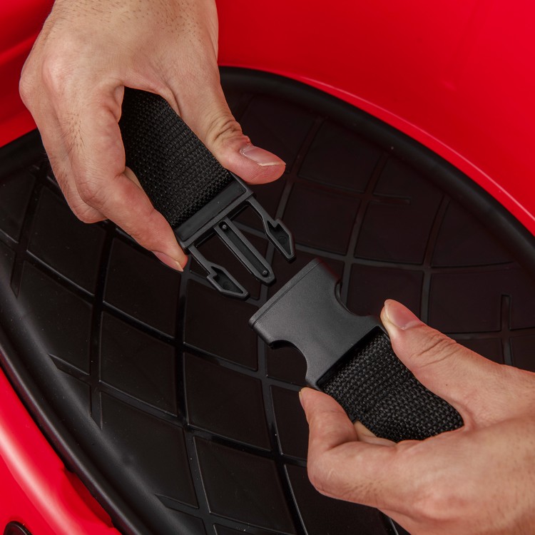 Hands connecting the safety strap of the 12V Electric Kids Ride on Bumper Car, designed for secure and fun playtime.
