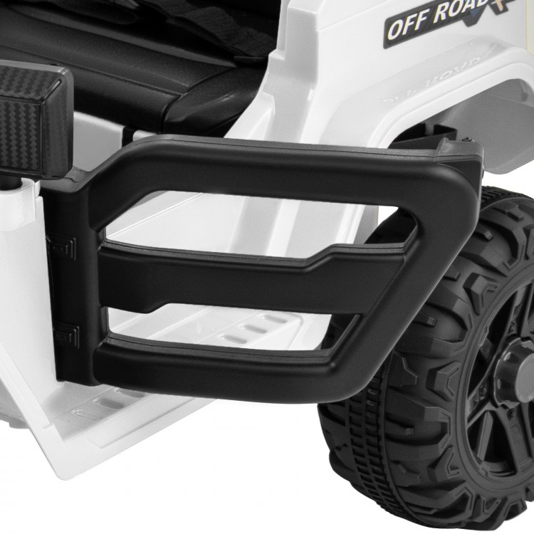 Close-up of the sturdy black handle on the 12V kids ride-on truck, designed for safety and ease of use.