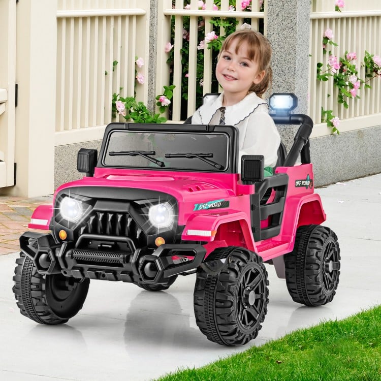 Pink 12V kids ride-on truck with remote control, all-terrain wheels, and LED headlights for outdoor fun.