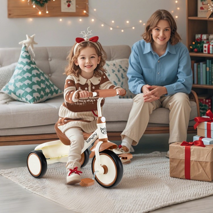 Toddler tricycle in beige with adjustable seat and rear basket, perfect for kids aged 3-5 years, shown indoors.