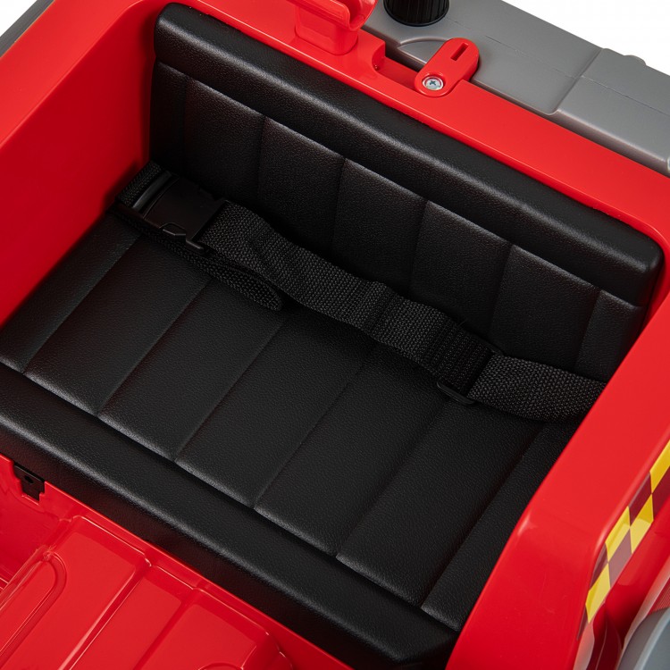 Spacious black seat with safety belt in the 12V red ride-on fire truck for kids, designed for comfort and security.