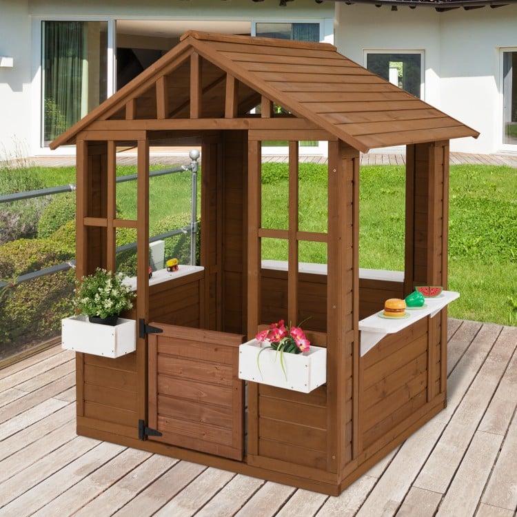 Outdoor playhouse with serving stations, made of premium fir wood, featuring windows and a sturdy door for kids 2+.