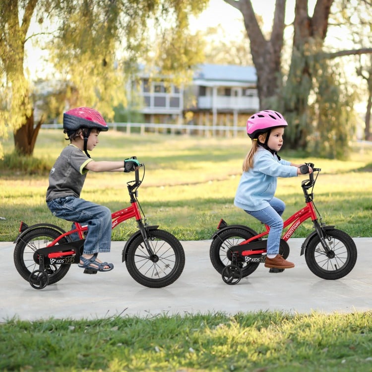 Two kids riding a 12-inch adjustable kids bike in red, featuring training wheels, reflectors, and a bike bell.