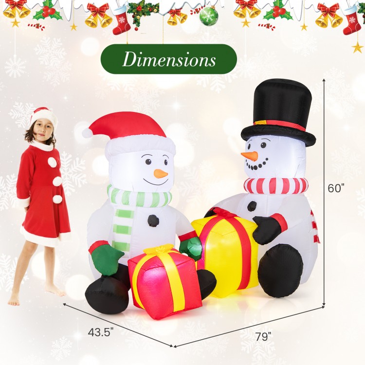 Cute 5-foot inflatable snowmen with gift boxes, pre-lit with LED lights, perfect for festive indoor or outdoor.