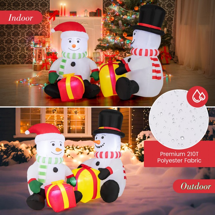 Cute 5-foot inflatable snowmen with gift boxes, made of premium 210T polyester, perfect for indoor and outdoor holiday.