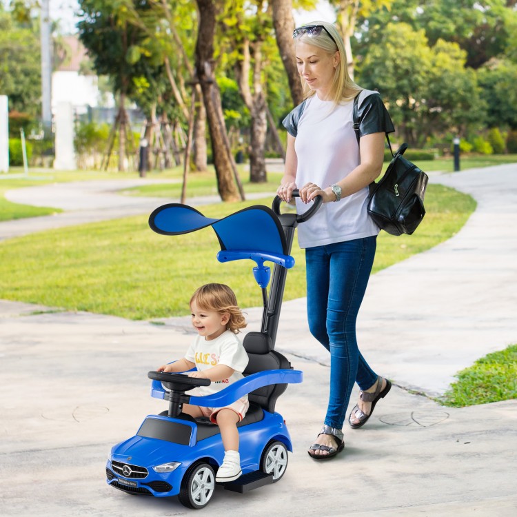 Blue 3-in-1 Mercedes-Benz licensed push car with canopy, suitable for toddlers aged 18-36 months, being used outdoors.