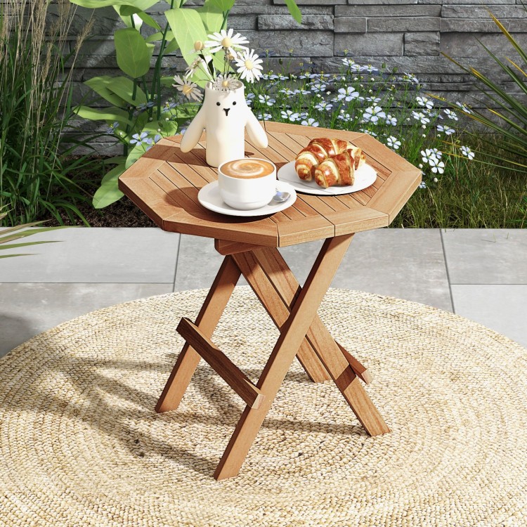 Teak wood octagon coffee table with slatted tabletop and X-shaped legs, perfect for outdoor camping and picnics.