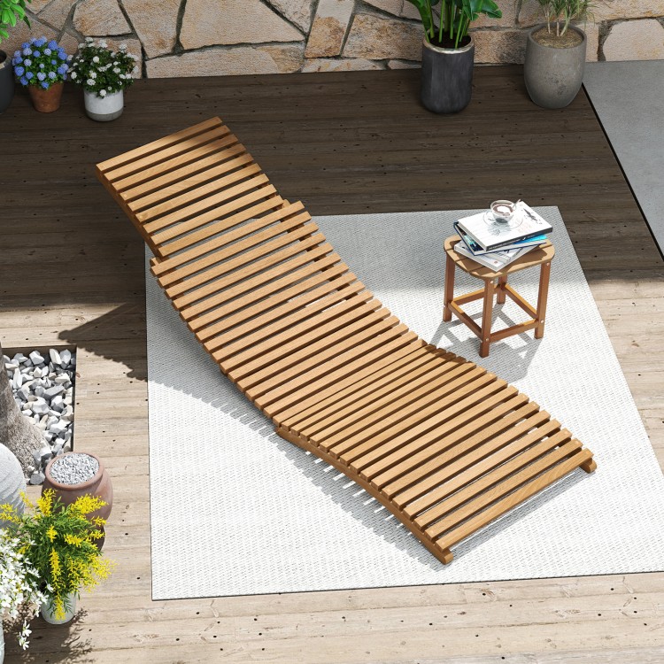 Teak wood folding chaise lounge chair with slatted seat, ideal for poolside relaxation and outdoor comfort.