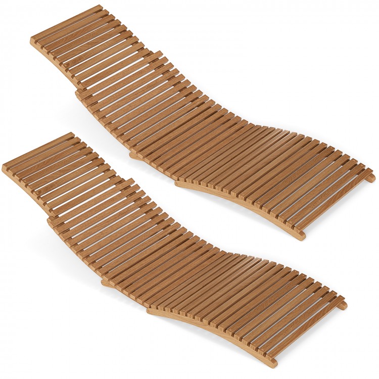 Teak wood folding chaise lounge chairs with slatted seats, ideal for backyard and poolside relaxation.