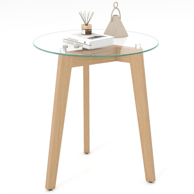 Round tempered glass end table with solid rubber wood legs, ideal for living room or bedroom use.