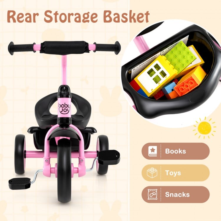 Rear view of the pink toddler tricycle with adjustable seat and storage basket for books, toys, and snacks.