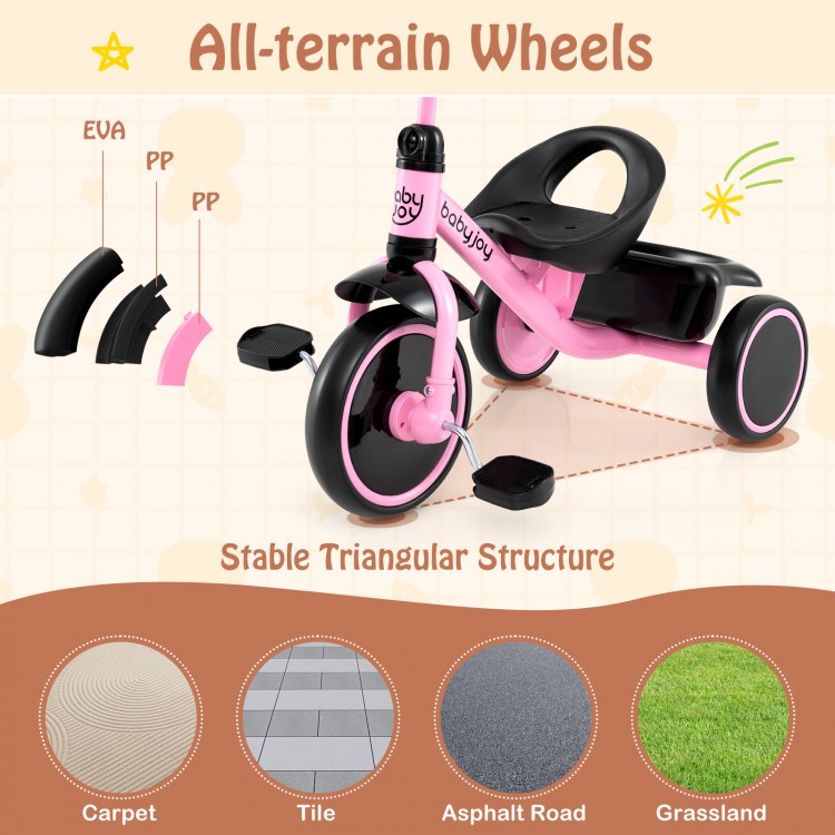 Close-up of the all-terrain wheels on the pink toddler tricycle, designed for durability and versatility on various.
