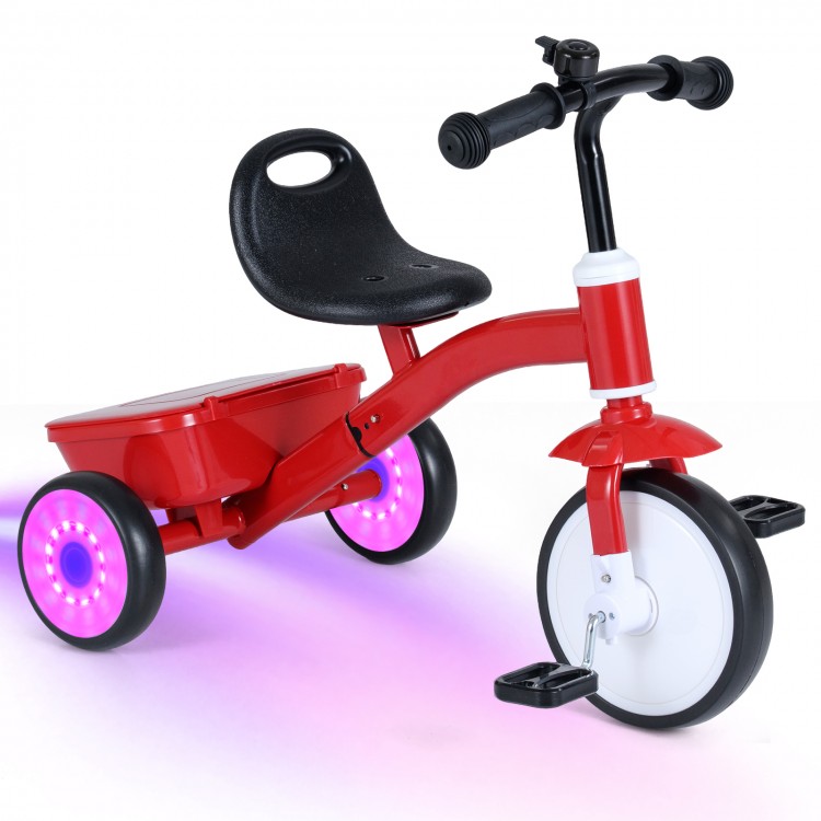 Toddler tricycle with glowing wheels, adjustable seat, and rear storage bin for indoor and outdoor playtime.