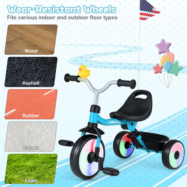 Toddler tricycle in blue with glowing wheels, adjustable seat, and storage basket, suitable for various surfaces.