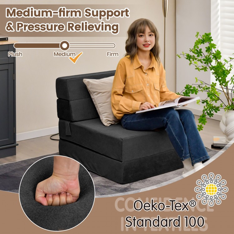 Tri-fold folding chair in black with plush surface, ideal for lounging, gaming, or sleeping in small spaces.