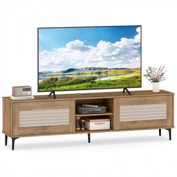 TV stand in oak finish with fluted doors, supporting TVs up to 70 inches, featuring open shelves and concealed storage.