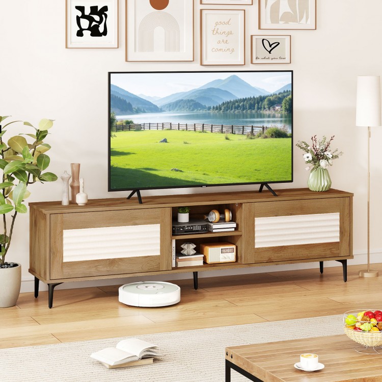 TV stand for TVs up to 70 inches in oak with waveform fluted doors, featuring open shelves and concealed storage.