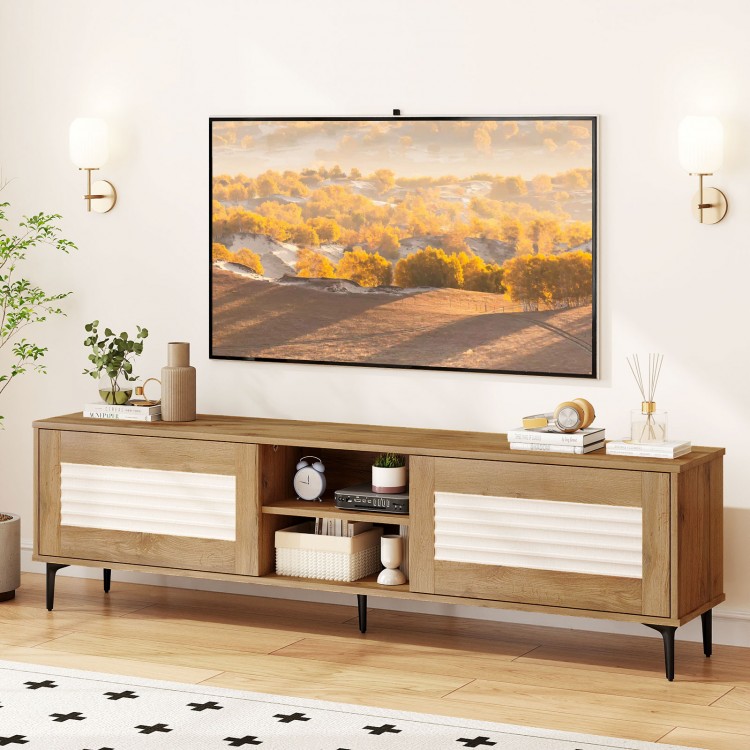 TV stand with waveform fluted doors, oak finish, supporting TVs up to 70 inches, featuring open shelves and concealed.