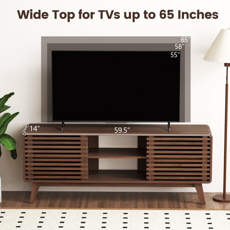 TV stand for TVs up to 65" with sliding doors, adjustable shelves, and walnut finish, perfect for living room storage.