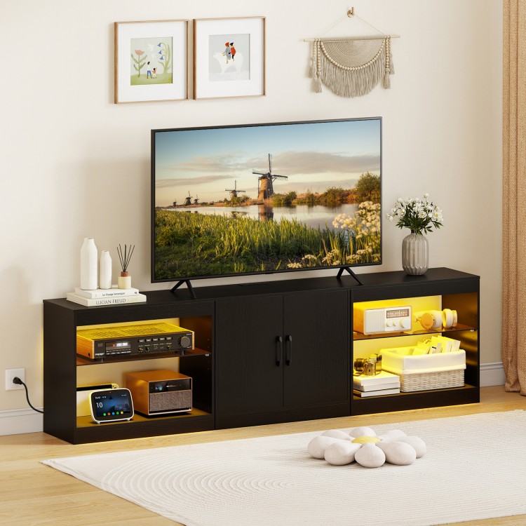 TV stand in black for TVs up to 85 inches, featuring RGB LED lights, open shelves, and a 2-door cabinet for storage.