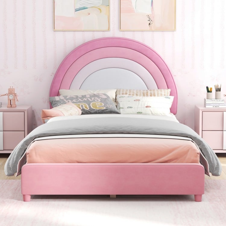 Twin bed frame with adjustable gradient pink headboard, soft velvet fabric, and sturdy wooden slats for kids' safety.