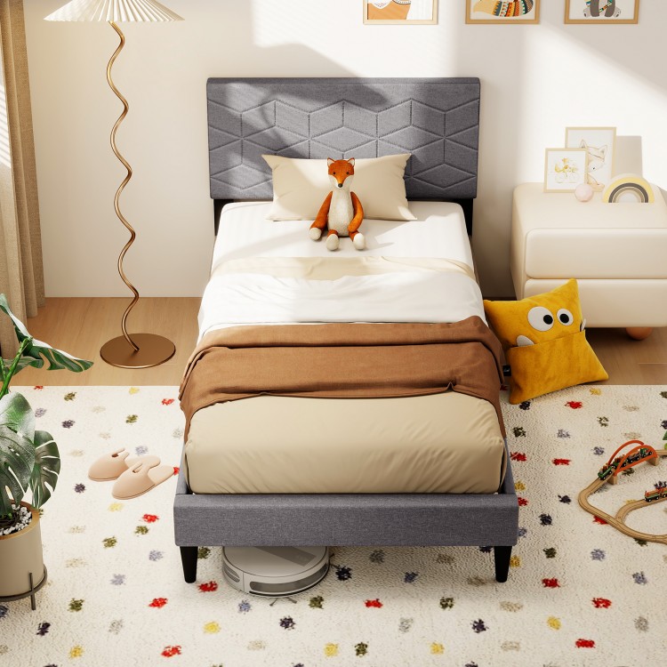 Twin size bed frame with upholstered headboard, geometric quilting, and breathable linen fabric for stylish comfort.