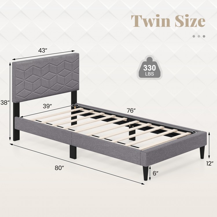 Twin size bed frame with upholstered headboard, geometric quilting, and sturdy slats for modern bedroom decor.