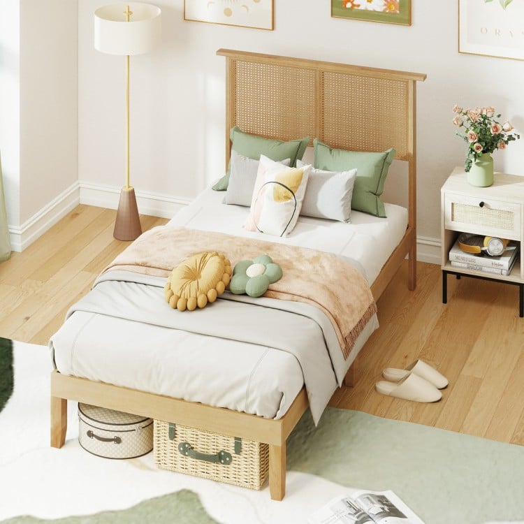 Twin size bed frame showcasing a boho rattan headboard, designed for stability with solid rubber wood legs and plywood.