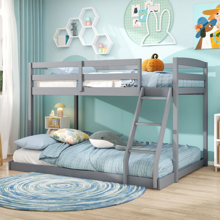 Twin over full gray bunk bed frame with integrated ladder and guardrails, ideal for kids' rooms or guest accommodations.
