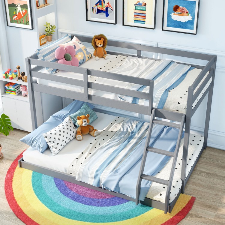 Twin over full gray bunk bed frame with integrated ladder and guardrails, ideal for kids' rooms and space-saving.