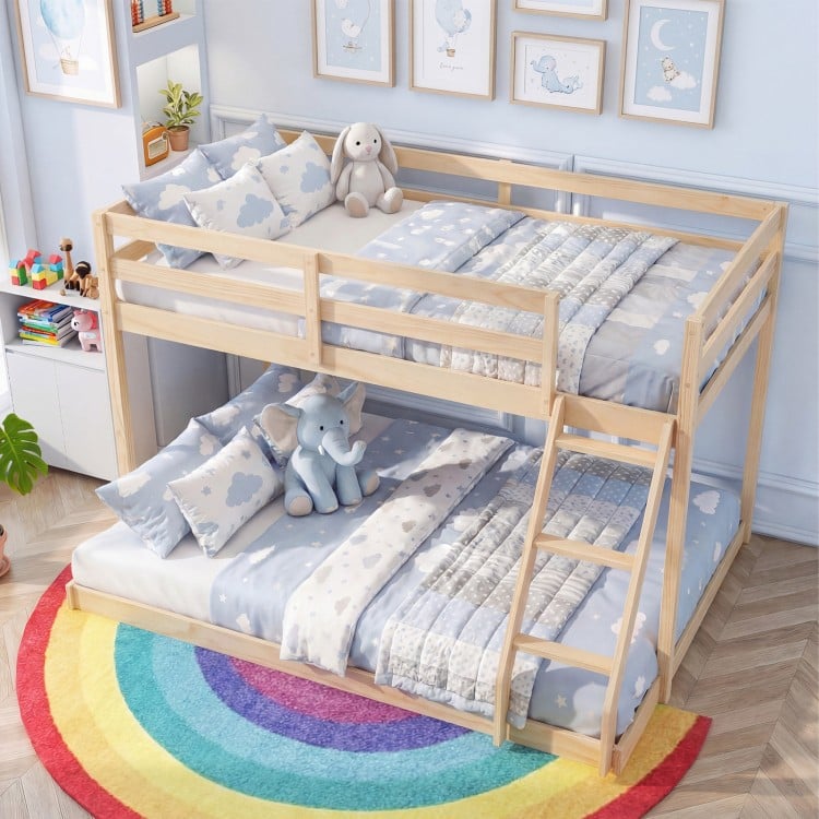 Twin over full bunk bed frame in natural pine wood, featuring guardrails and integrated ladder for kids' rooms.
