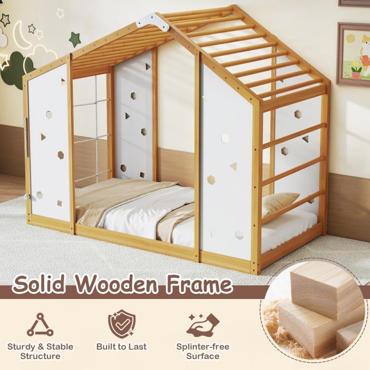 Twin size Montessori floor bed with solid wooden frame, monkey bars, and playful geometric cut-outs for kids' rooms.