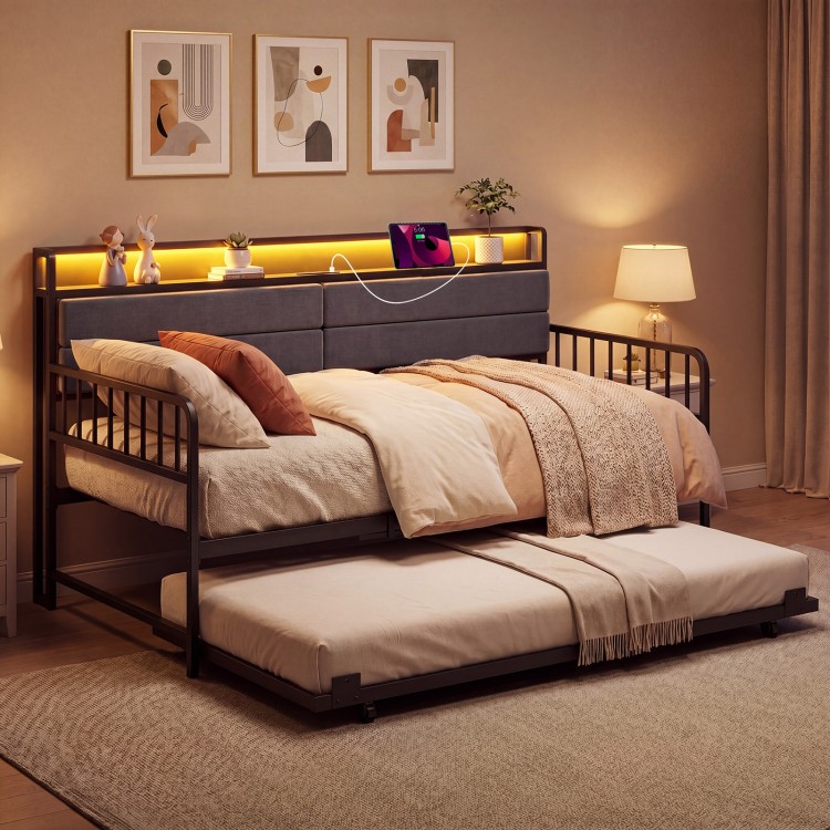 Pull-out trundle bed beneath the Twin Size Daybed in rustic brown, offering extra sleeping space for guests and.