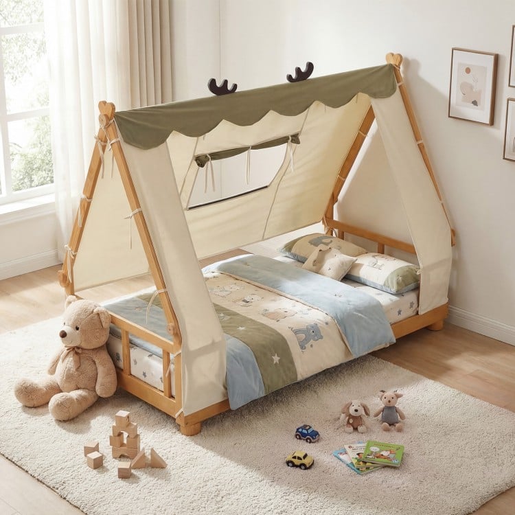 Twin size wooden bed with removable tent, antler theme, and protective side rails for a cozy children's sleep space.
