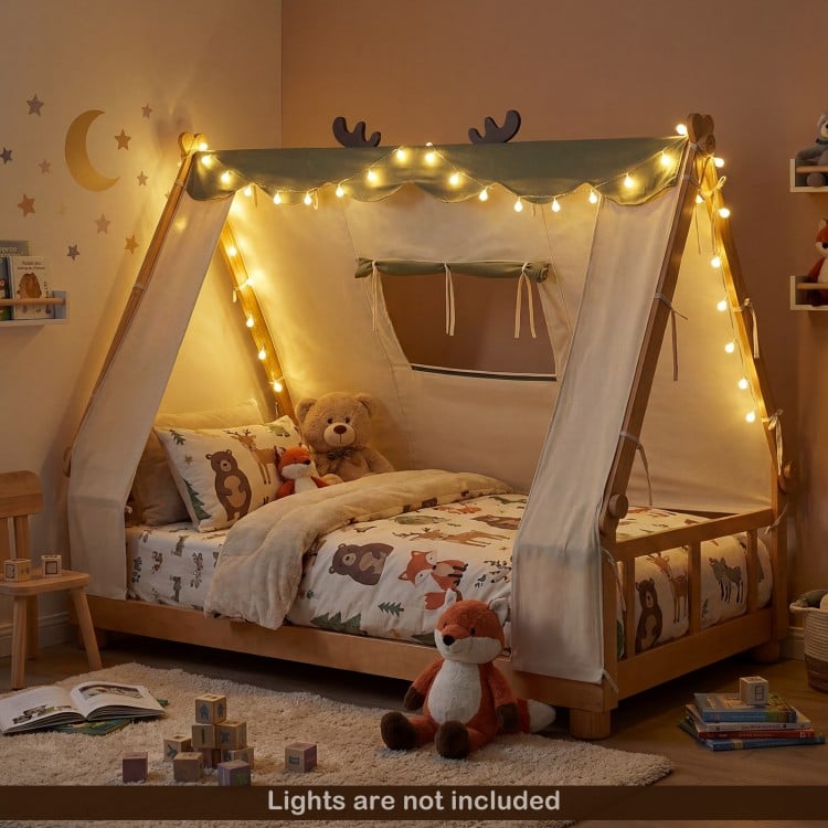 Cozy twin size wooden bed featuring an antler-themed frame and plush fabric tent, perfect for imaginative children's.