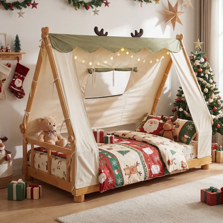 Twin size wooden bed with removable tent, antler-themed frame, and plush fabric for a cozy children's sleep space.