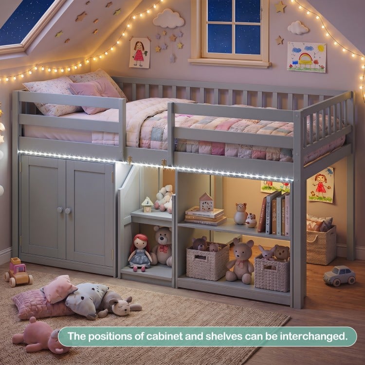 Twin size gray loft bed with LED lights, under-bed storage, and shelves for organizing toys and books in a cozy kids'.