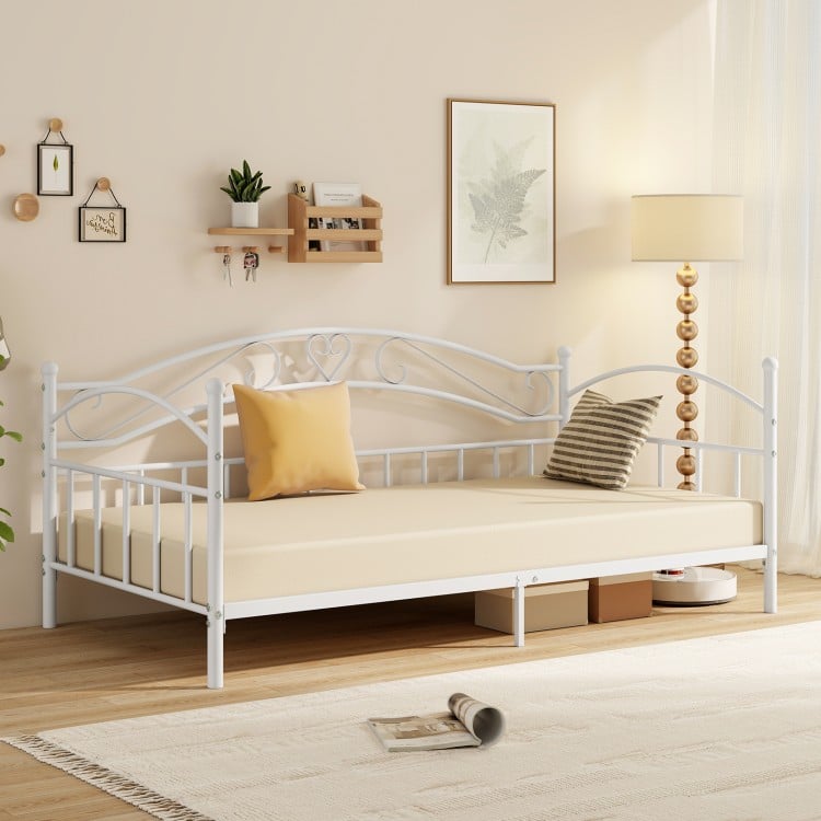 Twin size metal daybed frame in white with heart-shaped design, perfect for bedroom seating and extra sleeping space.