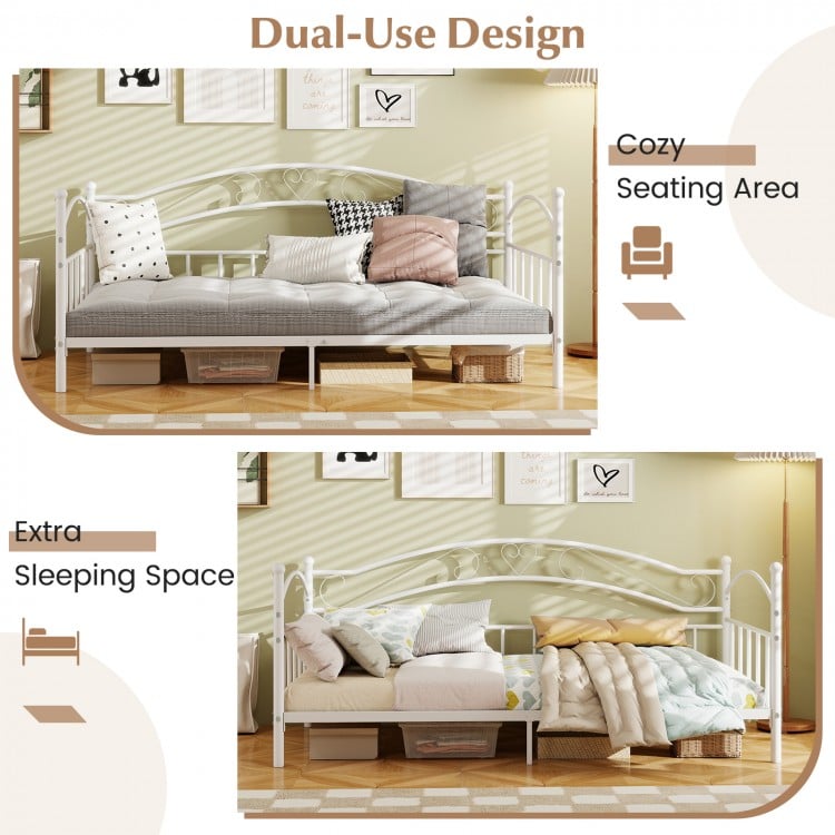 Twin size metal daybed frame in white, showcasing cozy seating and extra sleeping space with heart-shaped decor.