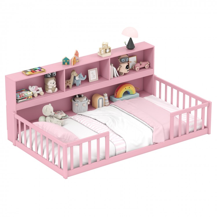 Twin size Montessori floor bed in pink with integrated bookshelf, perfect for kids' playtime and cozy resting.