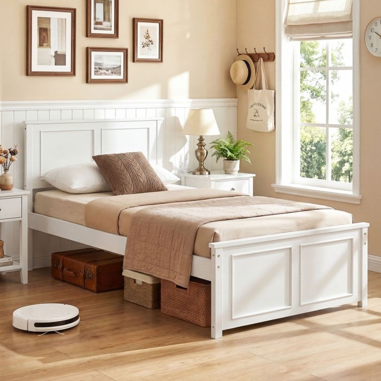 Twin size platform bed frame with headboard in white, featuring underbed storage and sturdy plywood slats for stability.