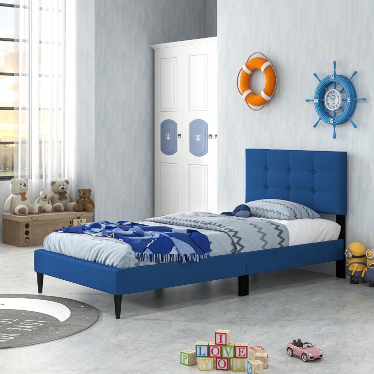 Twin size upholstered platform bed in blue with button tufted headboard, ideal for bedrooms and guest rooms.