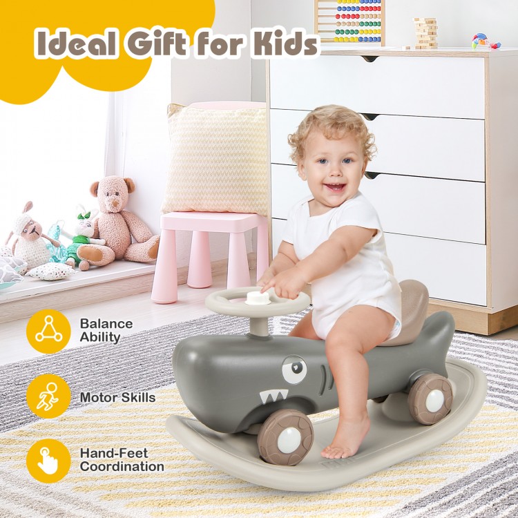 Convertible rocking horse and sliding car in dark gray, promoting balance and motor skills for kids with a secure.