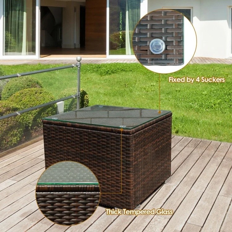 Square coffee table featuring thick tempered glass and rattan weave, secured with suckers for outdoor patio use.
