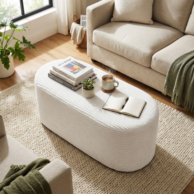 Upholstered beige ottoman bench with corduroy surface and high-density sponge, perfect for living room or hallway use.