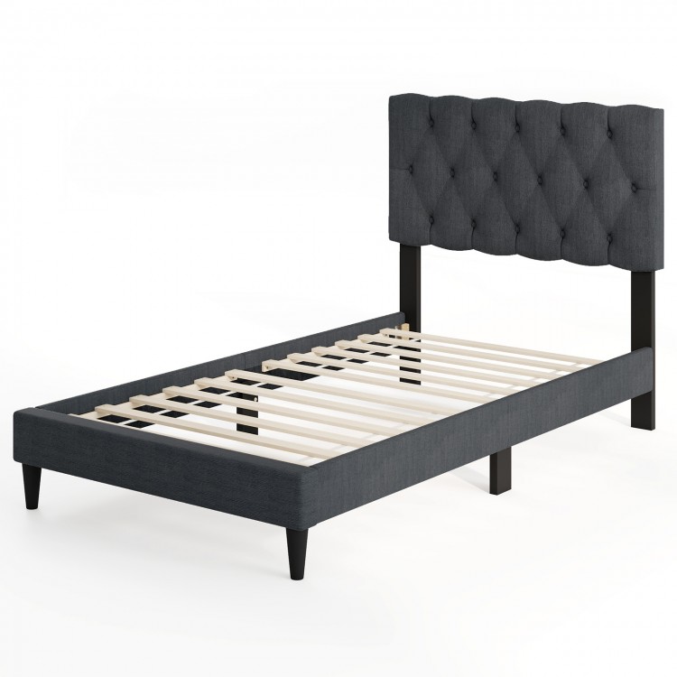 Gray upholstered platform bed with tufted headboard and wooden slats, designed for twin size, no box spring needed.