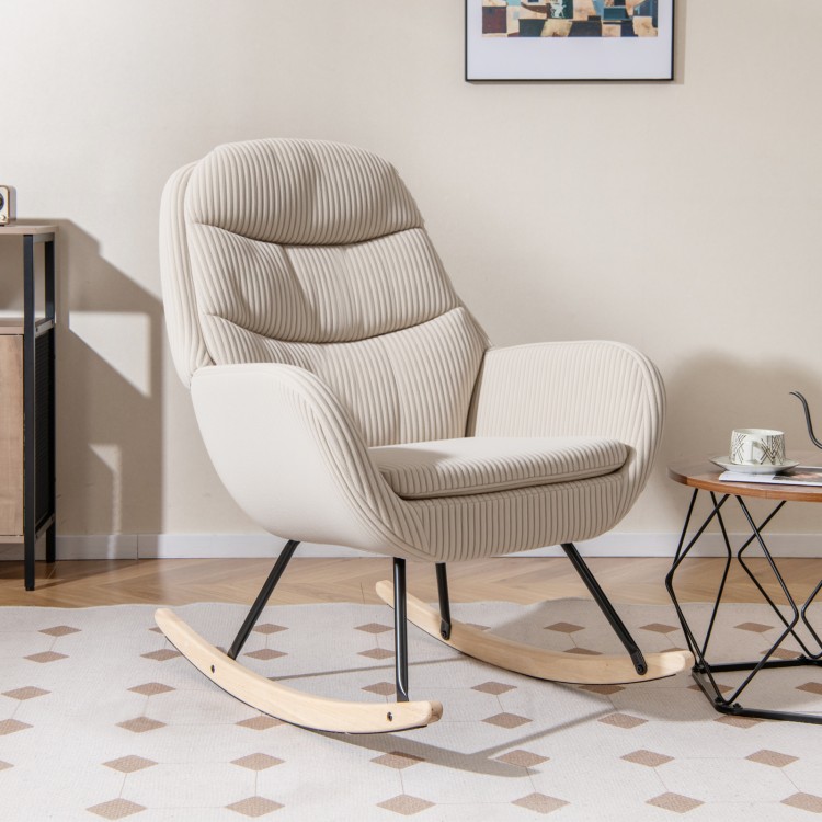 Upholstered rocking chair in beige with padded backrest and seat, ideal for nurseries and cozy living spaces.