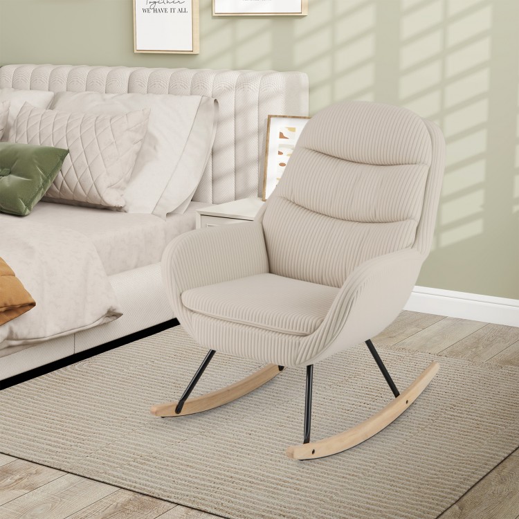 Upholstered rocking chair in beige with padded backrest and armrests, ideal for nurseries and cozy living spaces.