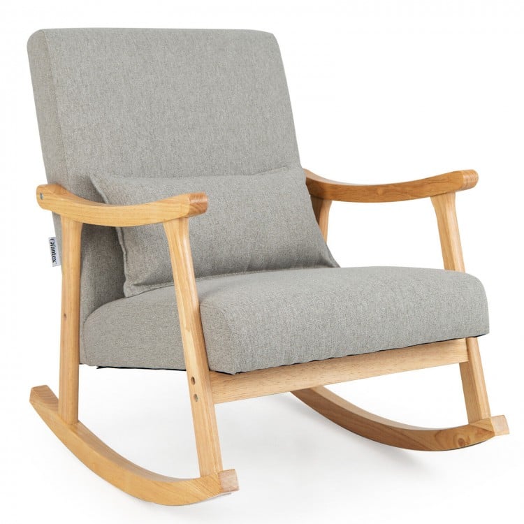 Gray upholstered rocking chair with rubber wood frame and lumbar pillow, perfect for living room or bedroom relaxation.