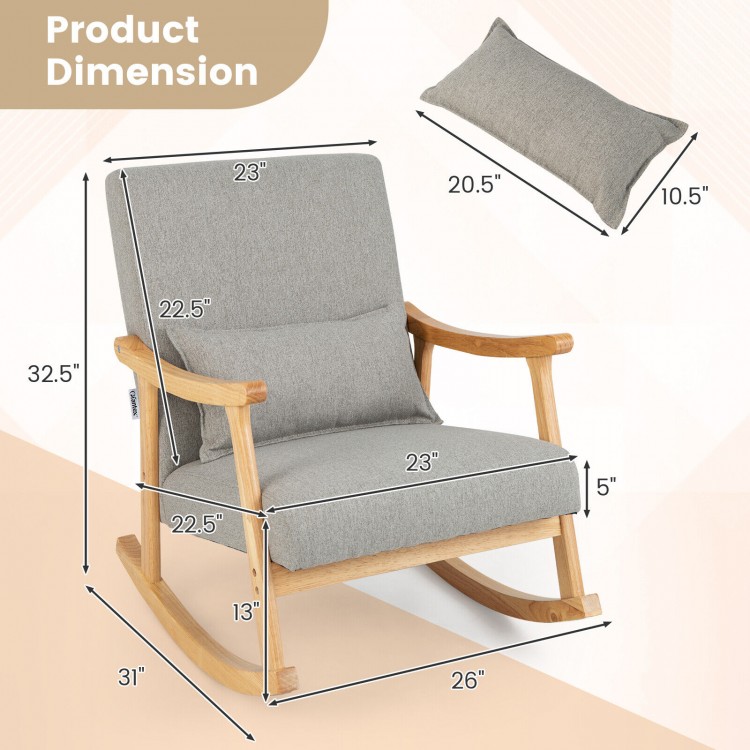 Upholstered rocking chair in gray with rubber wood frame, featuring a lumbar pillow, ideal for living room relaxation.